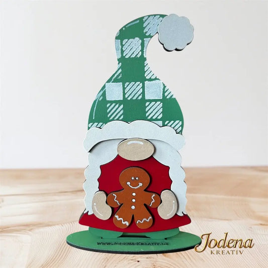 Weihnachtswichtelin_mit_Lebkuchenmann_auf_Holztisch