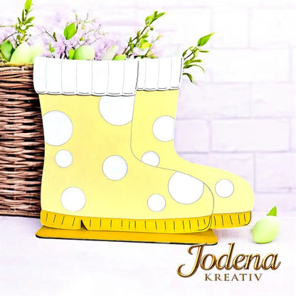 BasisForm_Gummistifel_solo_Korb-Motiveinsatz_helle_Mauer_geschmueckt