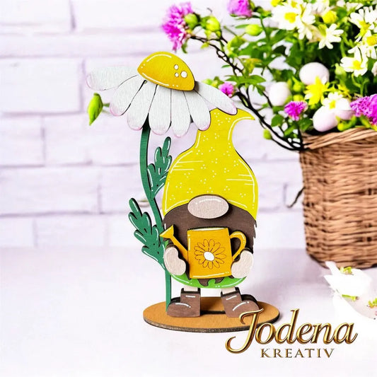 Gartenwichtel_mit_Gaensebluemchen_u._Giesskanne_Steinmauer_mit_Deko