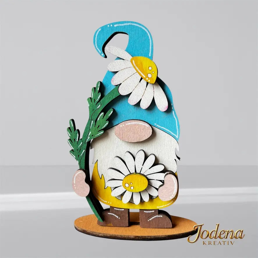 Gartenwichtel_mit_grosser_Gaenseblume_schlichter_Hintergrund