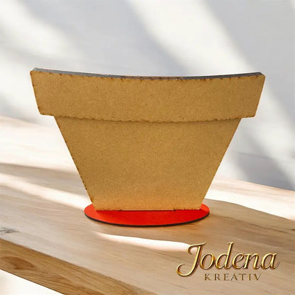 Grosser_Blumentopf_einseitig_Ansicht_Rueckseite_auf_Tisch