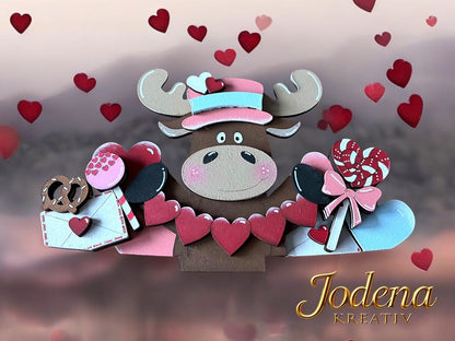 Korbeinsatz_Elch_mit_Herzgirlande_Herzhinergrund