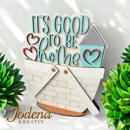 Korbeinsatz_It_s_good_to_be_home_in_weissem_Dekokorb_mit_Pflanzen_geschmueckt