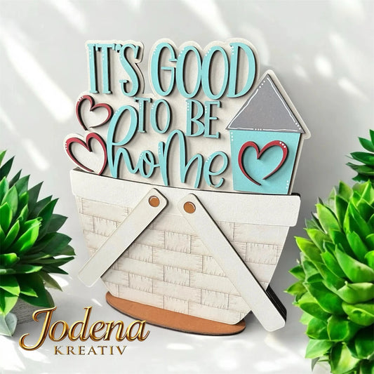 Korbeinsatz_It_s_good_to_be_home_in_weissem_Dekokorb_mit_Pflanzen_geschmueckt