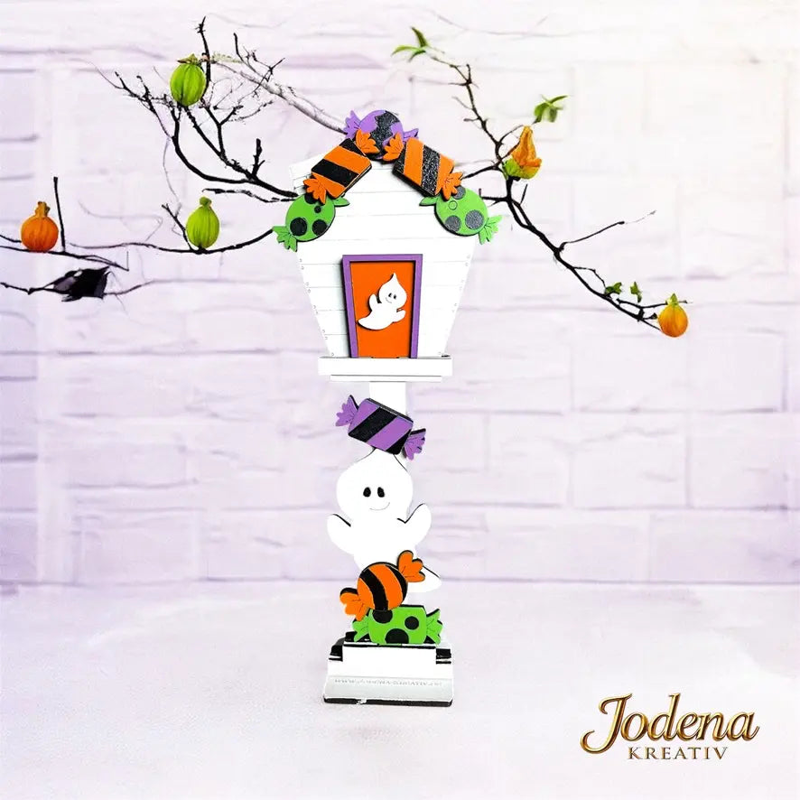 Mini_Vogelhaus_mit_Motiveinsatz_Helloween_helle_Steinmauer_geschmueckt