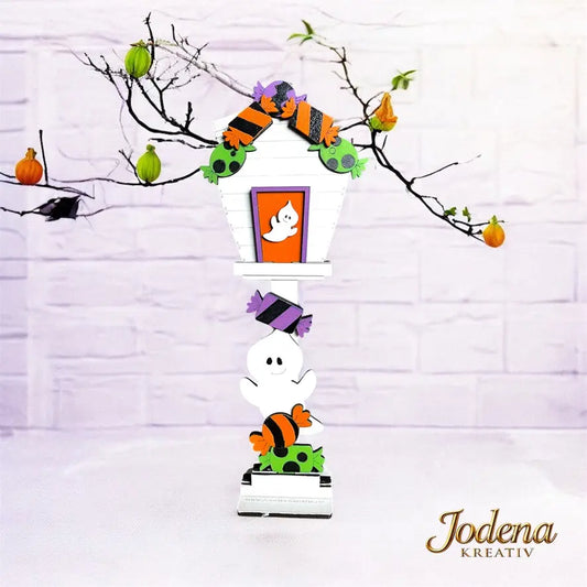 Mini_Vogelhaus_mit_Motiveinsatz_Helloween_helle_Steinmauer_geschmueckt