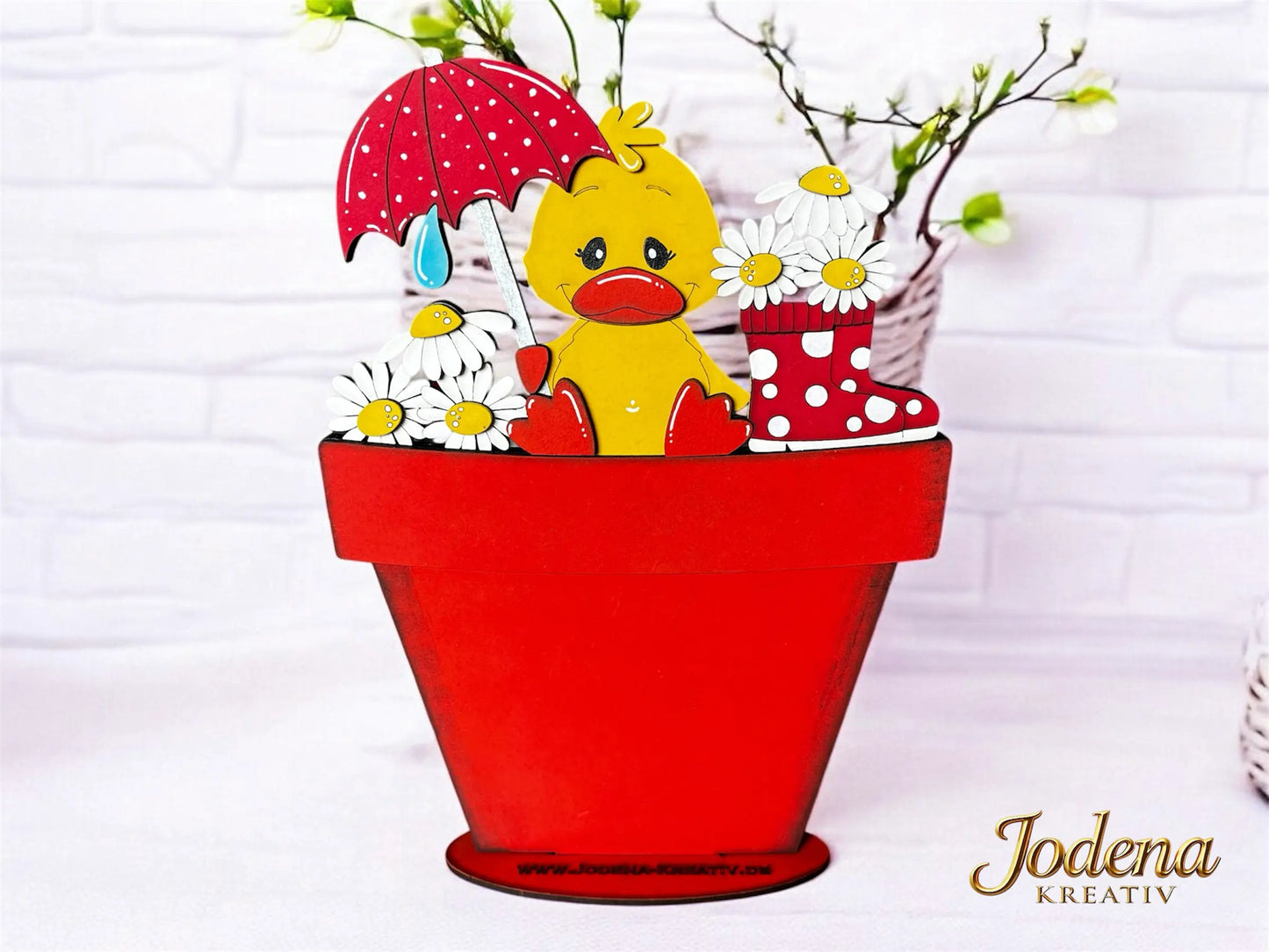 Motiveinsatz_Fruehlingsente_Blumentopf_helleSteinmauer