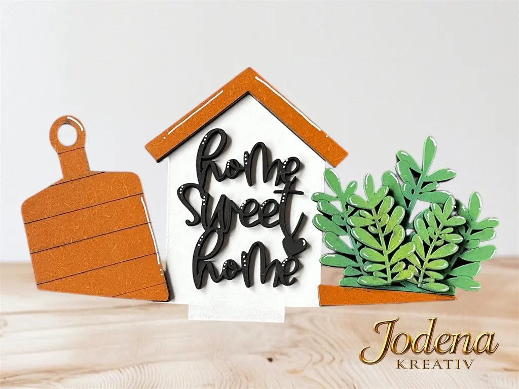 Motiveinsatz_HomeSweetHome_solo_ohneBuchstabe_aufHolztisch