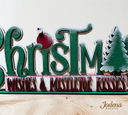 Regalsitter_Christmaswishes_mistletoekisses_aufHolztisch_Zoom