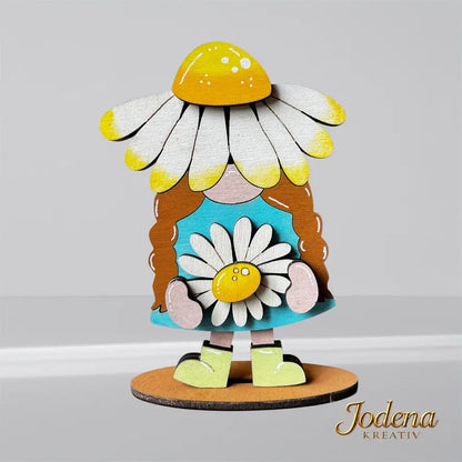 Wichtelin_mit_Gaensebluemchen-Hut_schlichter_Hintergrund